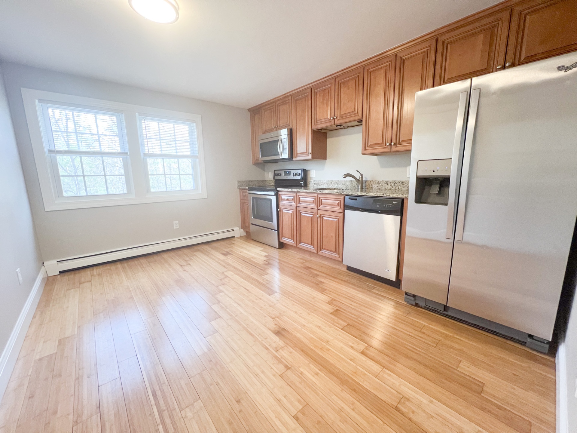 Stonehenge Apartments — kitchen with stainless appliances
